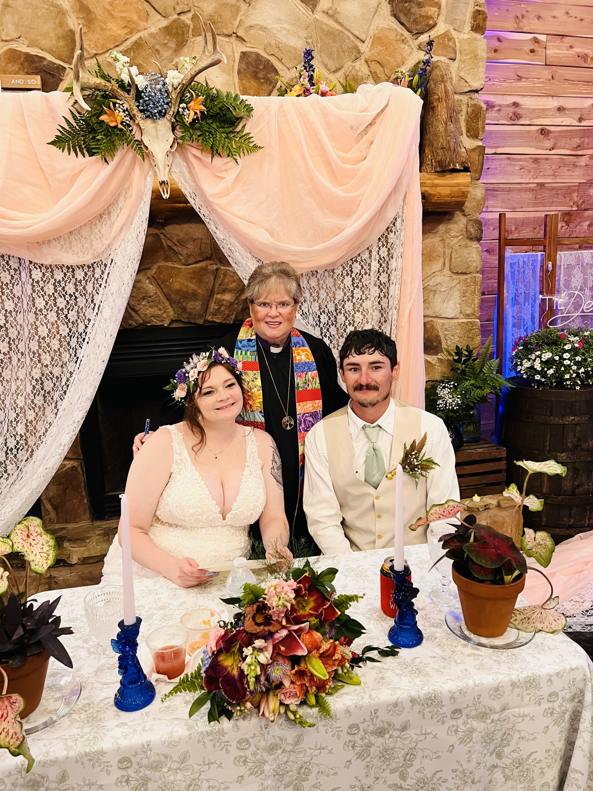 officiant Jen and couple at reception